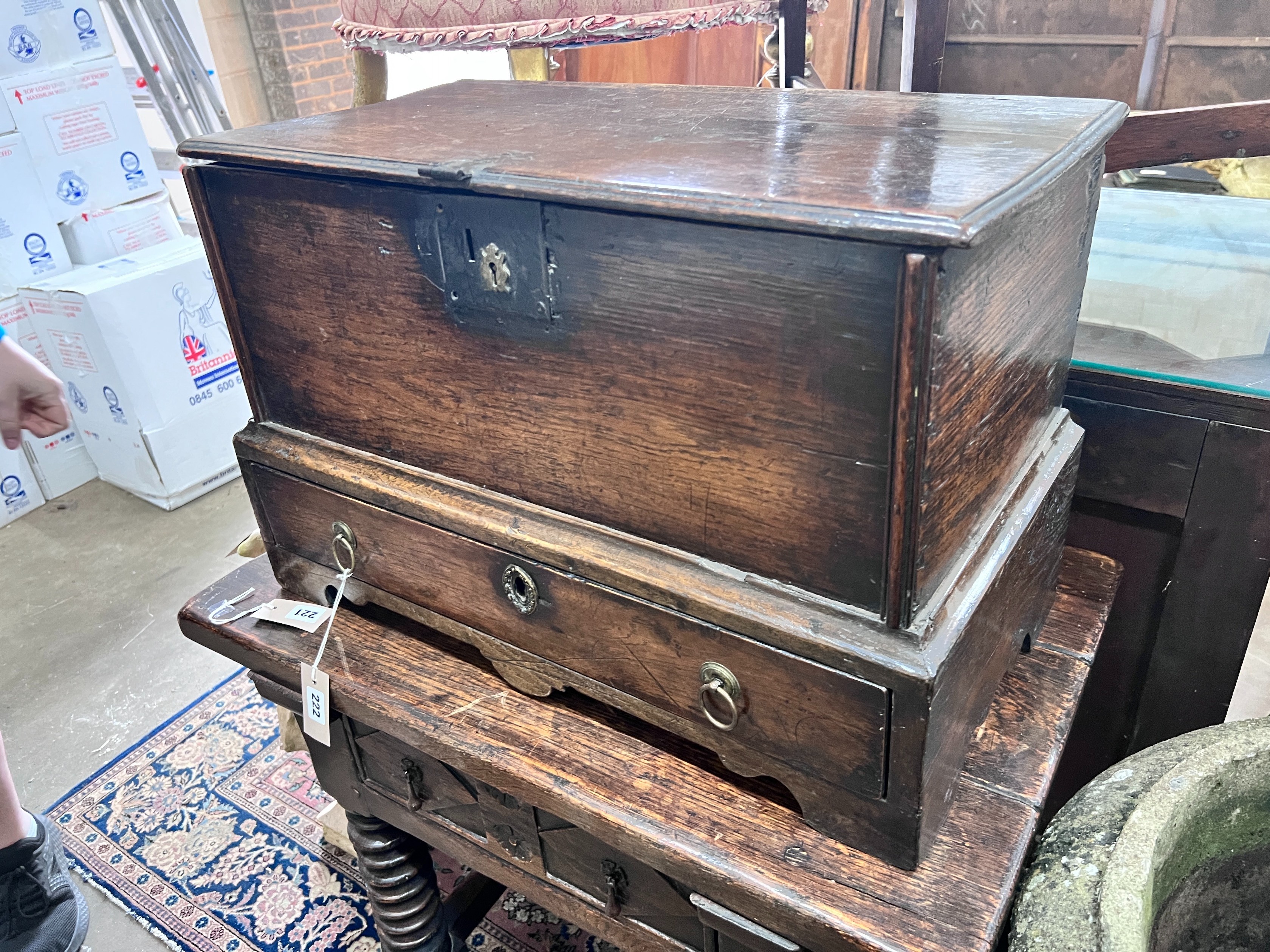 A small early 18th century oak mule chest, width 64cm, depth 34cm, height 42cm *Please note the sale commences at 9am.